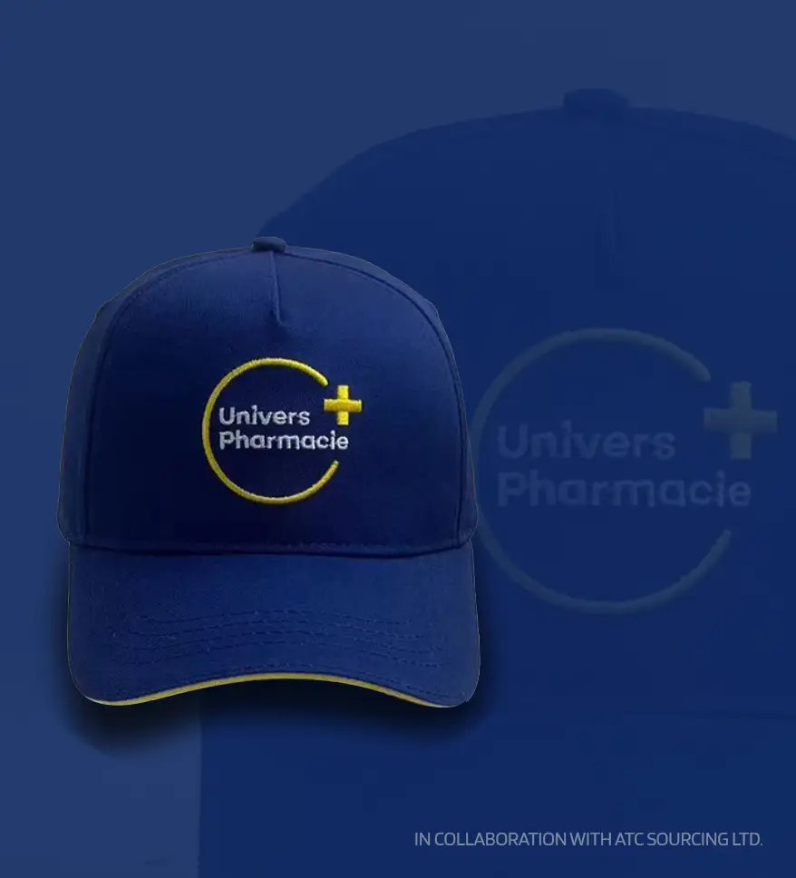 Univers Pharmacie logo embroidered on a cap, part of the brand identity designed by Concepduo